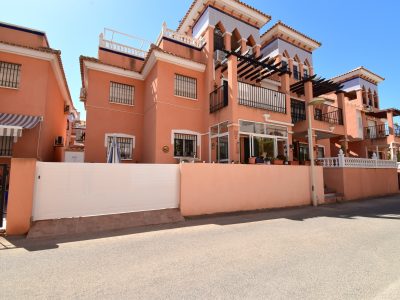2-bedroom apartment for sale in Orihuela Costa with glazed-in terrace and garden, Alicante, Spain
